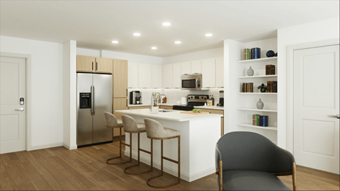 a kitchen with white cabinets and a white island with three stools